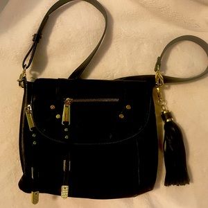Steve Madden crossbody purse with gold accents and lots of storage space